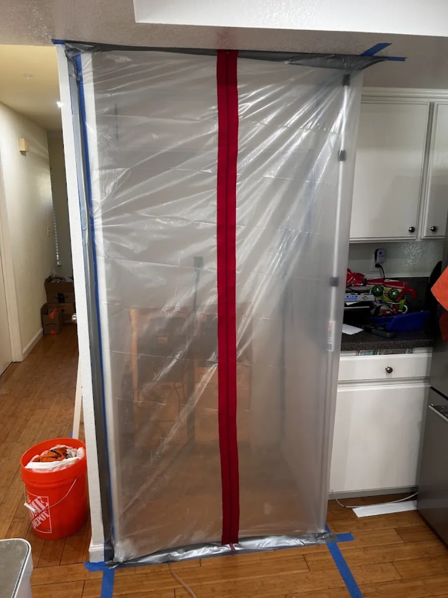 Temporary containment at a residential work-area entrance
